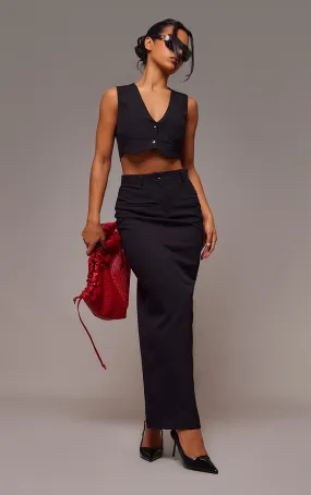Jupe longue de tailleur noire à détail coutures et poches