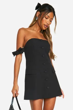 Robe courte de tailleur à col bardot et nœud